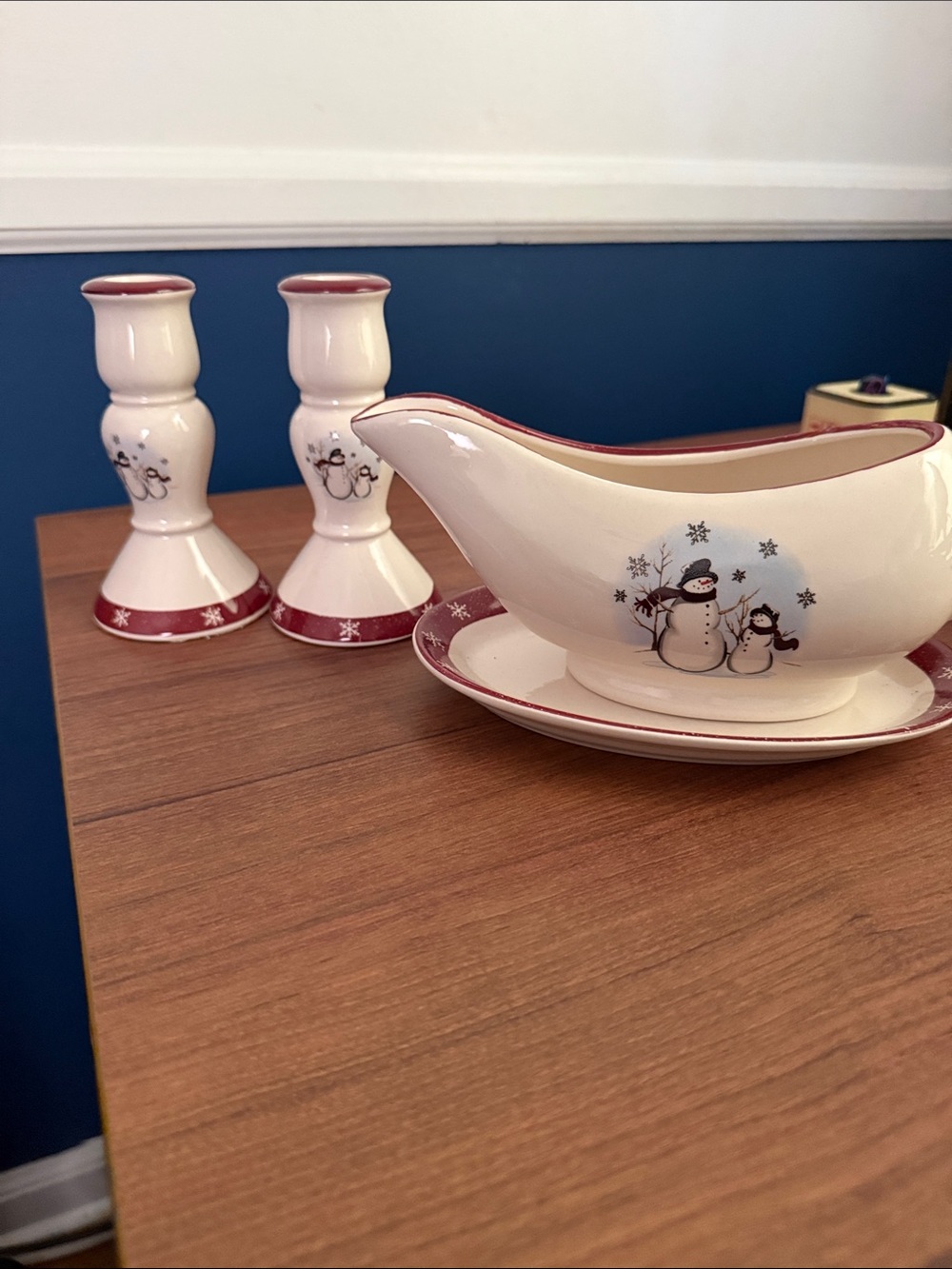 Cream colored Gravy bowl with saucer and candle stick holders with snowmen